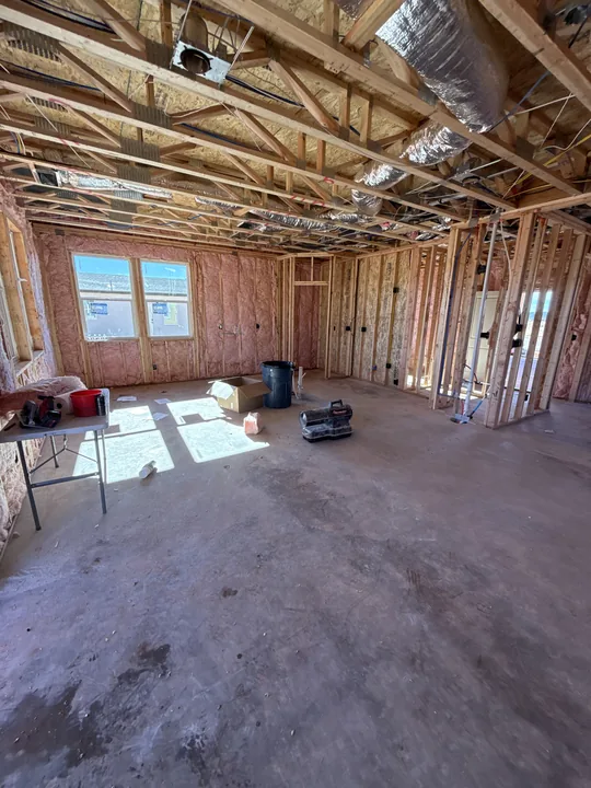 Two Story — Insulation before wallboard