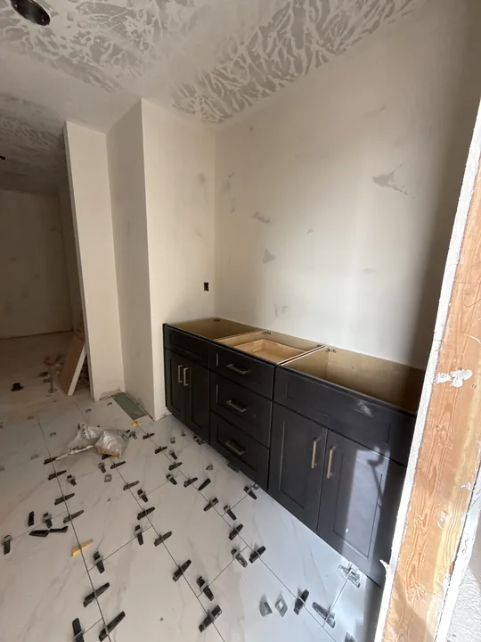 Two Story — Cabinet boxes and floor tile setting · bathrooms