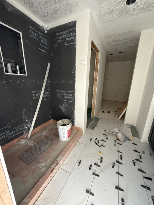 Two Story — Cabinet boxes and floor tile setting · bathrooms
