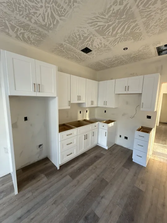 3 Bed / 2 Bath + Casita — Cabinets and flooring before countertops · kitchen