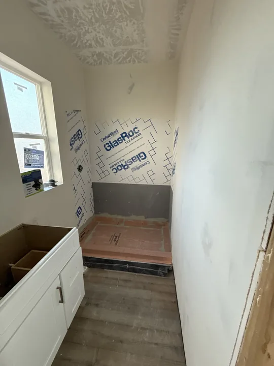 3 Bed / 2 Bath + Casita — Cabinets and flooring before countertops · bathrooms