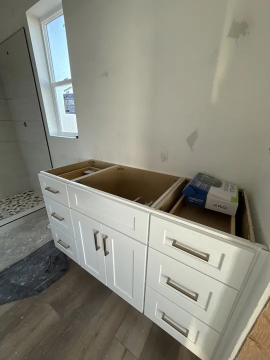3 Bed / 2 Bath + Casita — Cabinets and flooring before countertops · bathrooms