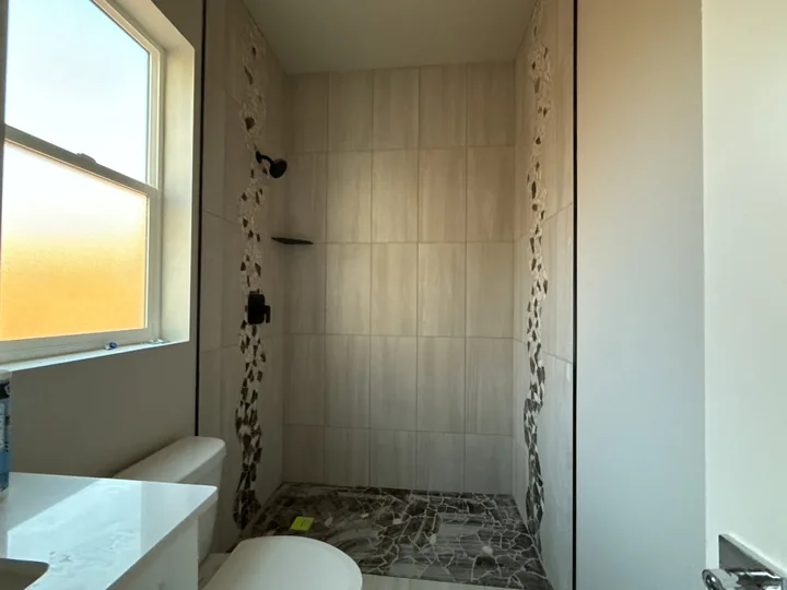 3 Bed / 2 Bath + Casita — Final fixtures and cleanup in progress · bathrooms