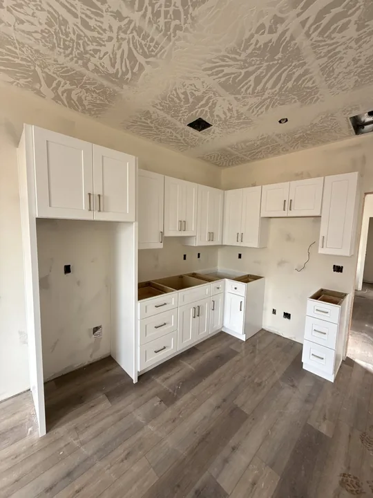 3 Bed / 2 Bath + Casita — Cabinets and flooring before countertops · kitchen
