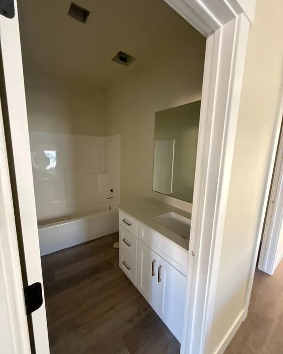 3 Bed / 2 Bath — Paint, flooring and countertops; fixtures pending · bathrooms