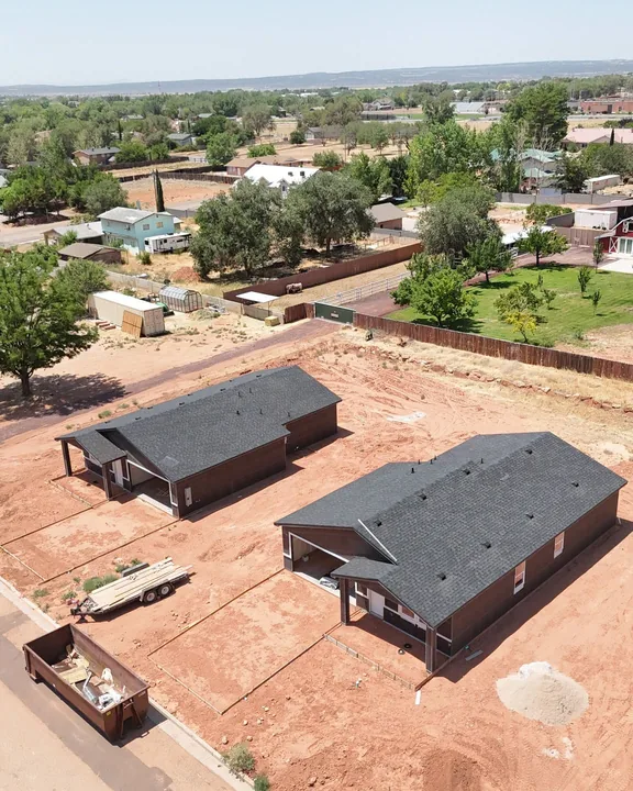 3 Bed / 2 Bath — Shingles installed and exterior weather barrier in place