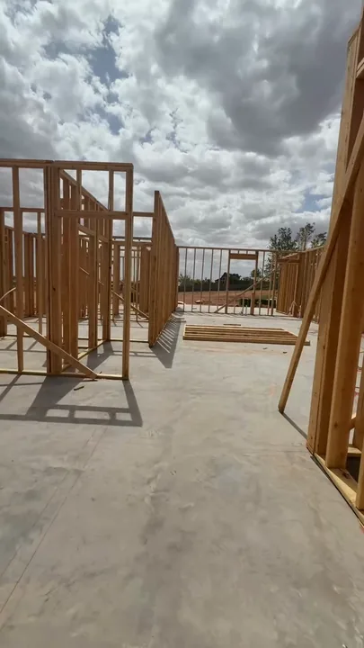 5 Bed / 3 Bath — Wall framing being raised and braced