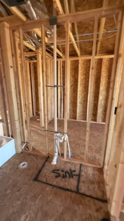 Two Story — Plumbing in open stud walls · bathrooms